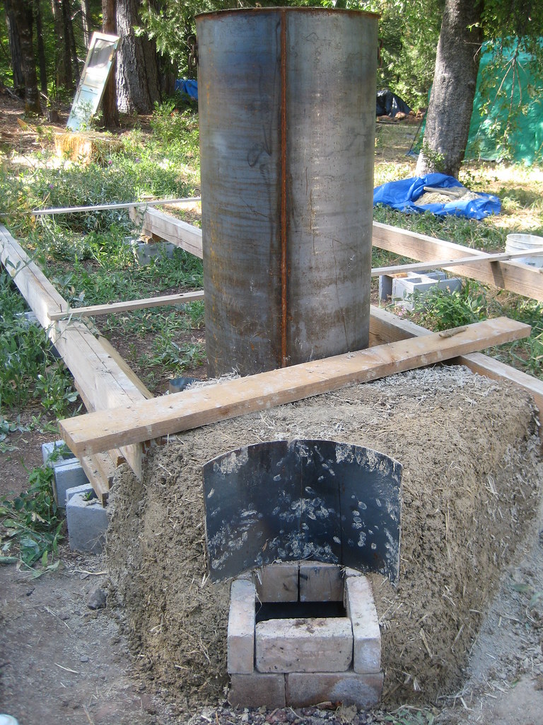 rocket mass heater further along lots more cob added the… Flickr