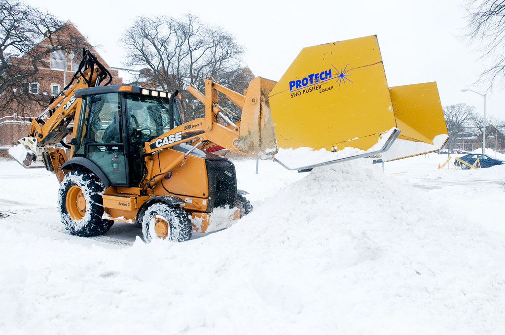 Parking Lot Snow Removal Tom Reeves, a mechanic, uses larg… Flickr