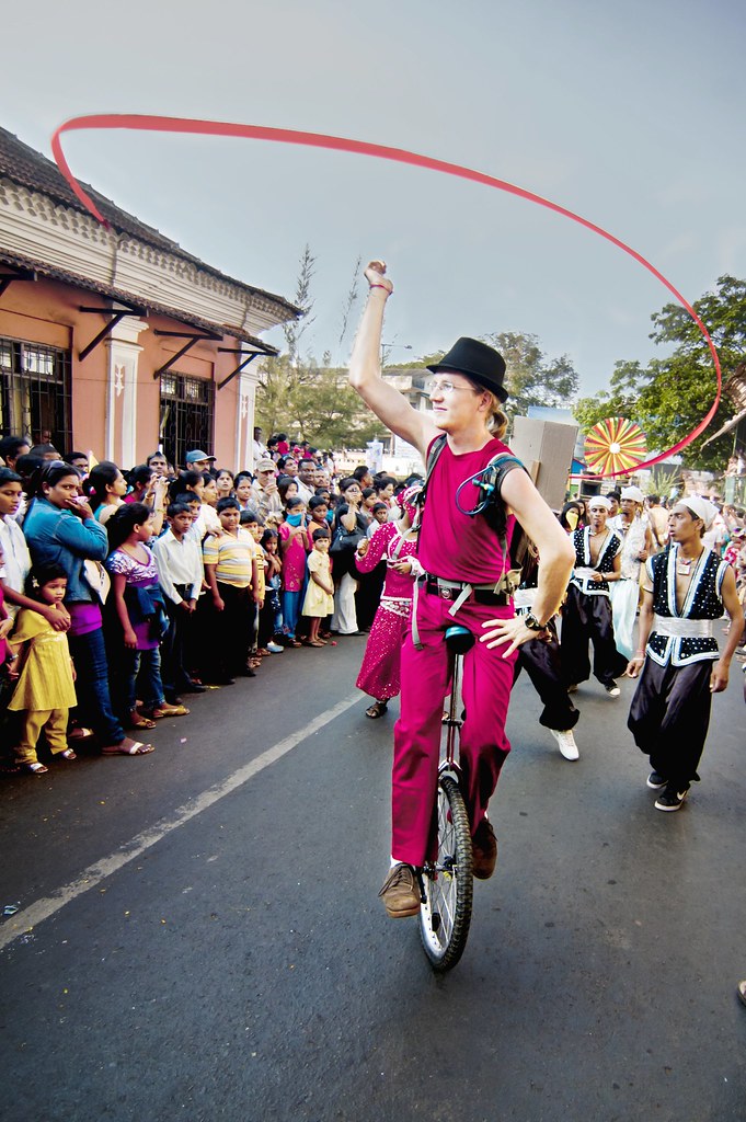 Goa Carnival A fine balance and strip of red ribbon at Mar… Flickr