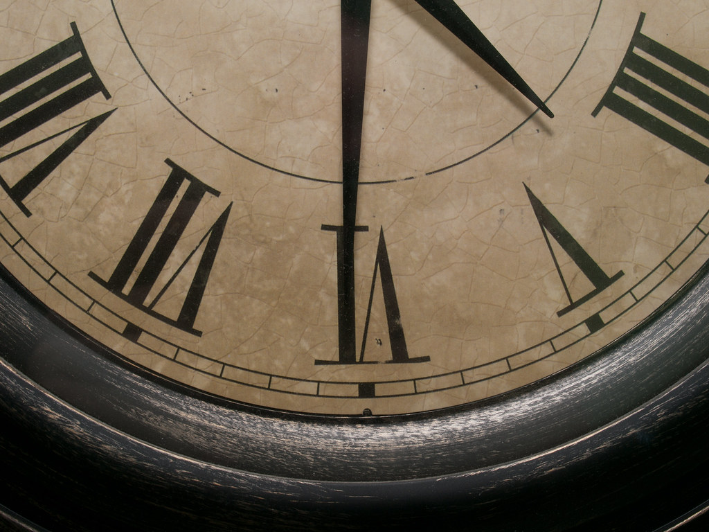 Old Clock Imitation antique clock hanging on the wall in m… Flickr