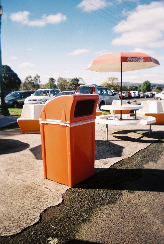Orange garbage bin Photographed using the Vivitar CV35, an… Flickr