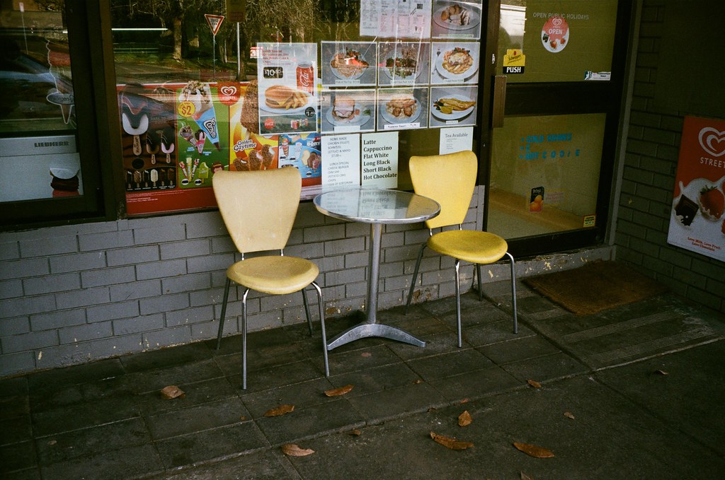 Two chairs and a table Photographed using the Zenit 35F, a… Flickr
