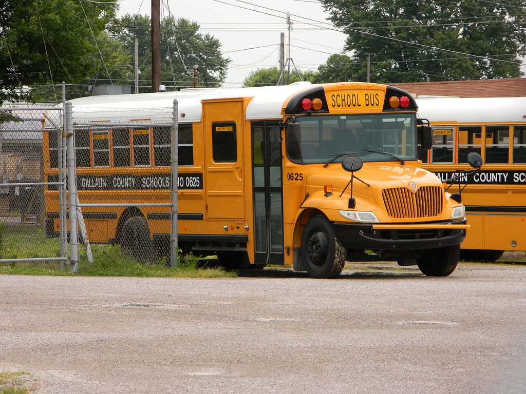 Gallatin County Schools 0625 (3) Bus lot Warsaw, KY. Flickr