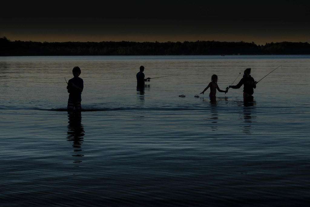 Fishing at dusk Duck Lake, Interlochen State Park Bailiwick Studios