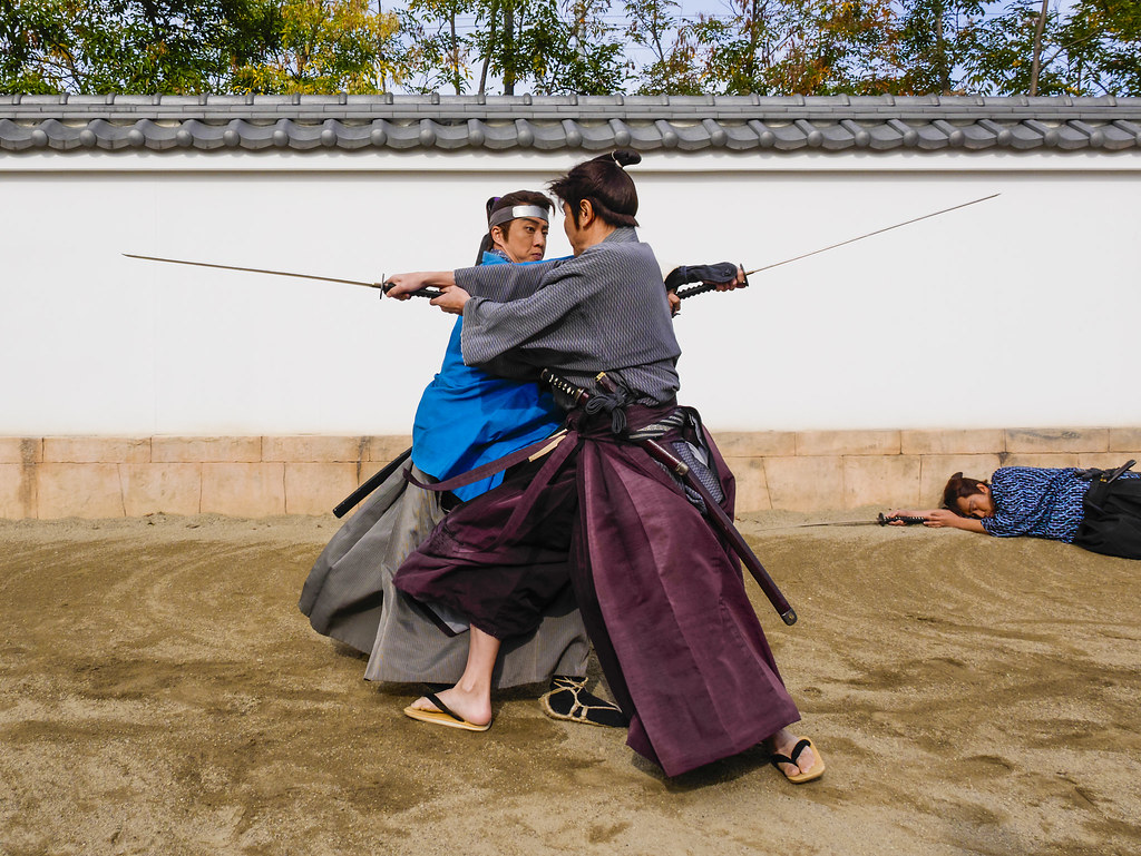 Two Samurai in duel, with a sword ready to attack, Japan, Kyoto. a