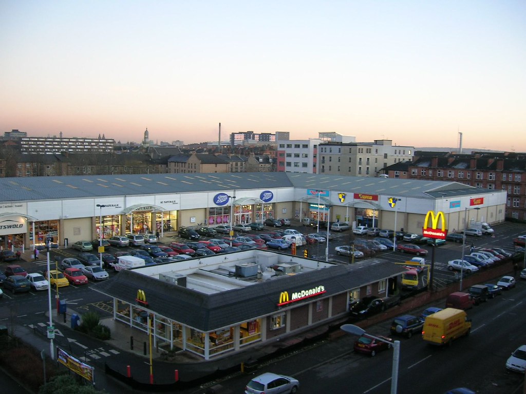 DSCN1704 Looking SouthEast over retail park on Crow Road.… Chris