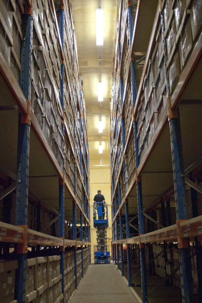 Cherry Picker In Warehouse Cherry picker working in a ware… Flickr
