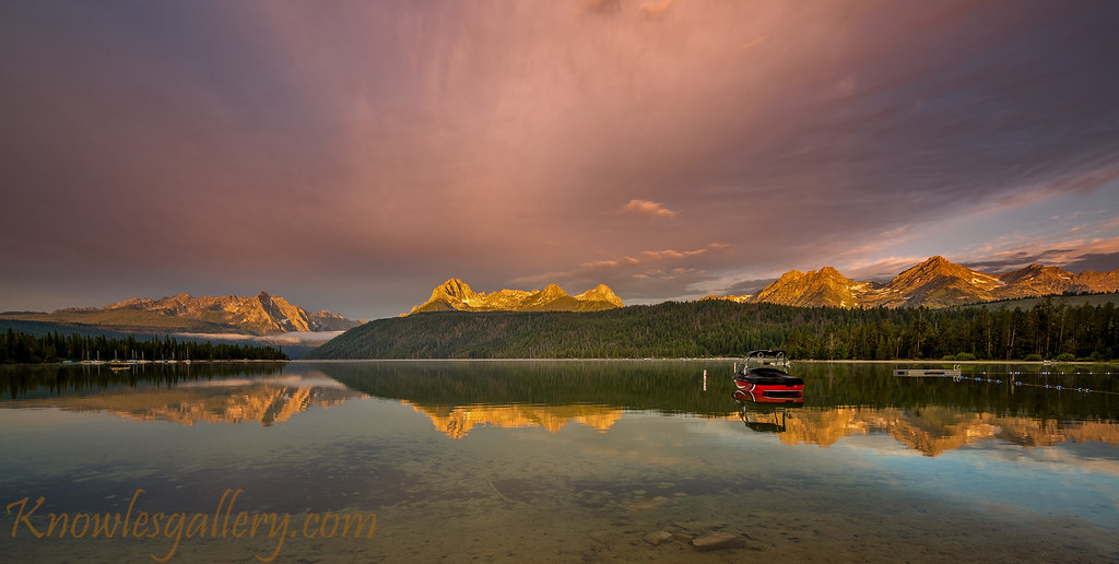 Boat on Redfish lake as the morning light hits the high mo… Flickr