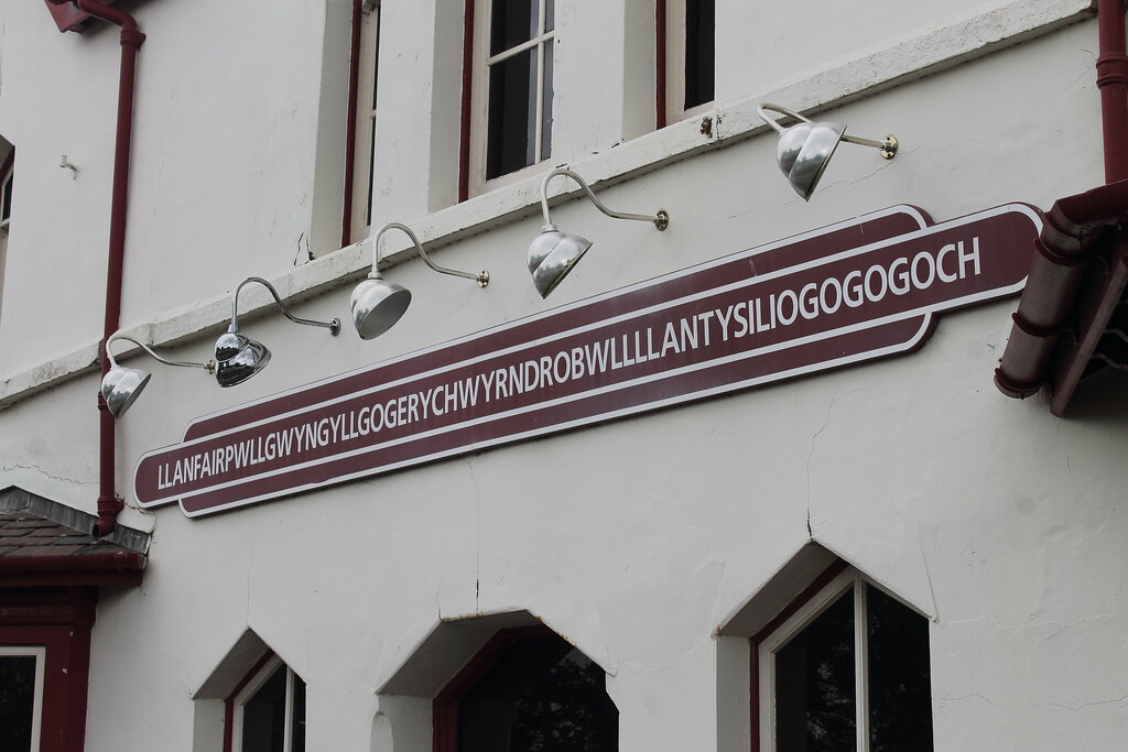 LLANFAIRPWLL (2) Probably the most photographed station si… Flickr