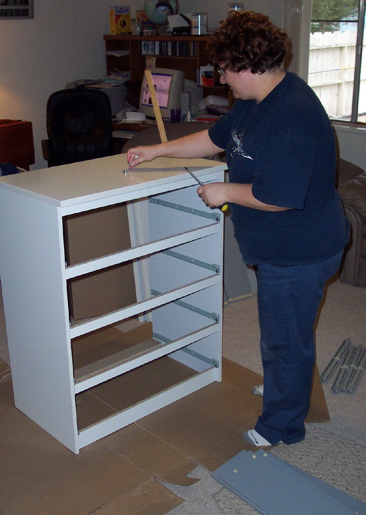 Patricia putting dresser together 4 12 06 Yesterday we dro… Flickr