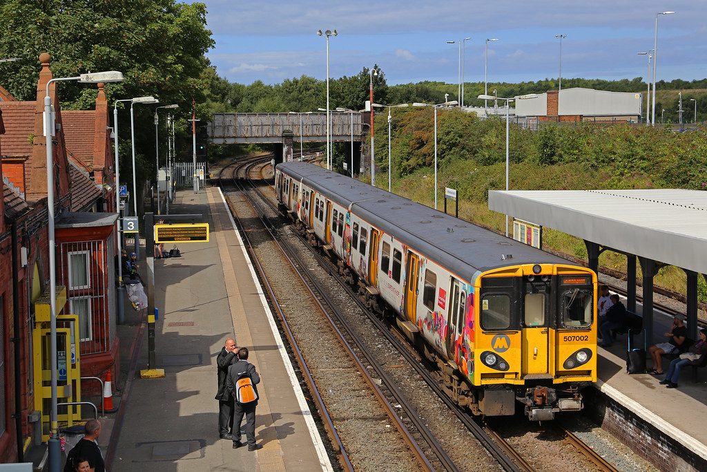 507002 Birkenhead North. In its distinctive livery promo… Flickr