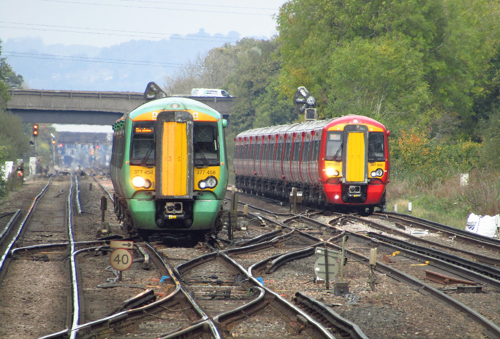 Three Bridges station, West Sussex It's red versus green i… Flickr