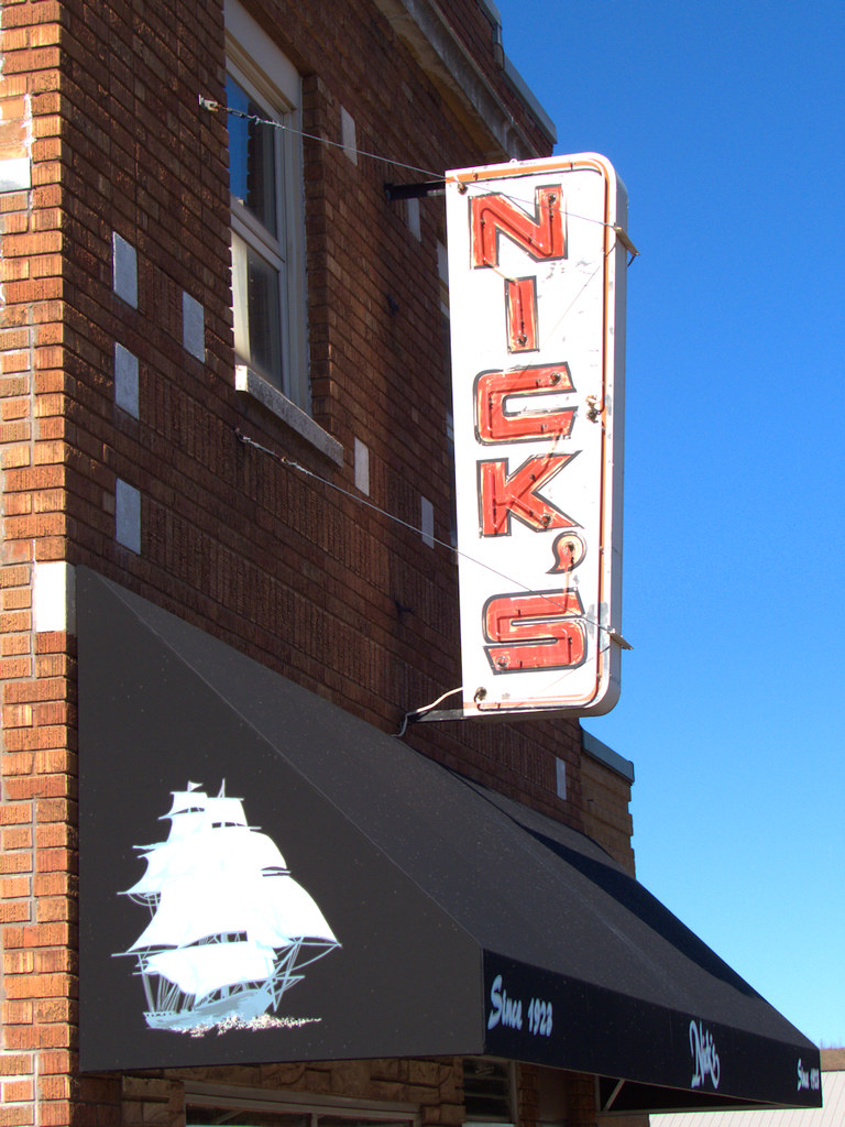 Nick's Bar Nick's Bar has stood on Broadway in Gilbert, Mi… Flickr
