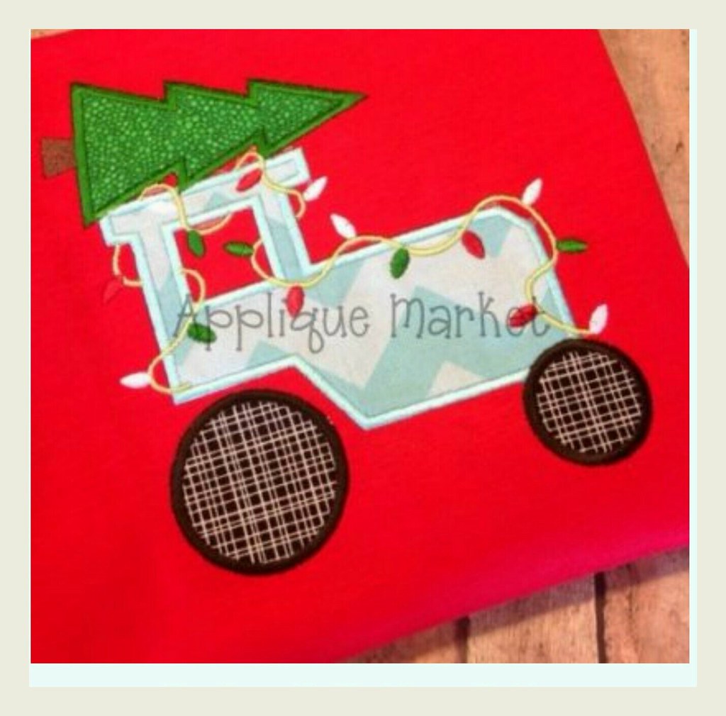 Christmas tractor wrapped in lights with tree Angela Mabry Flickr