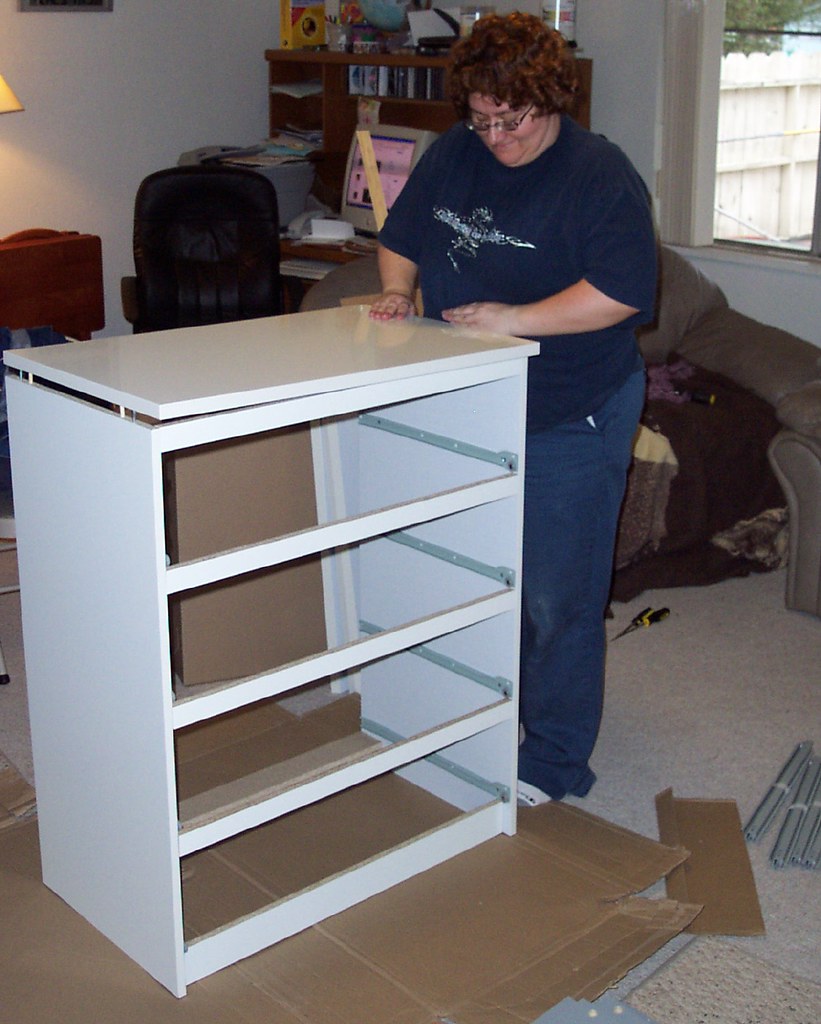 Patricia putting dresser together 4 12 06 Yesterday we dro… Flickr