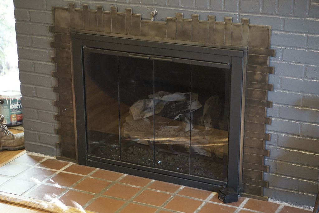 Stainless steel fireplace surround to fit around a gas ins… Flickr