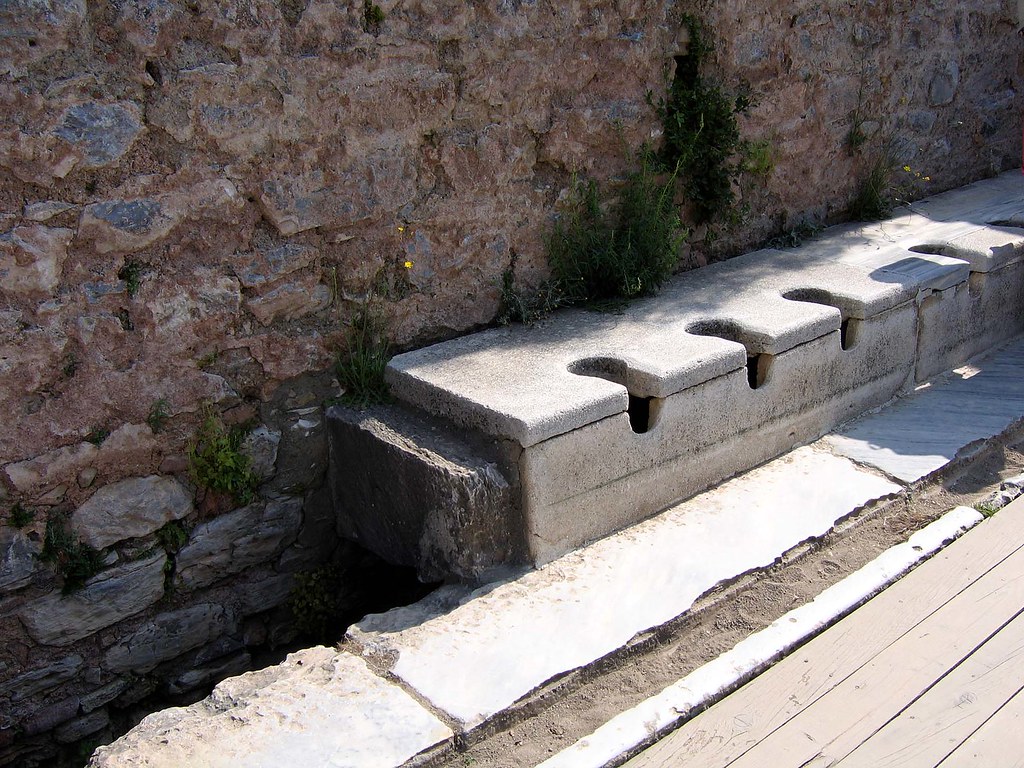 Latrines at Ephesus Ancient public bathrooms. Not much pri… Flickr