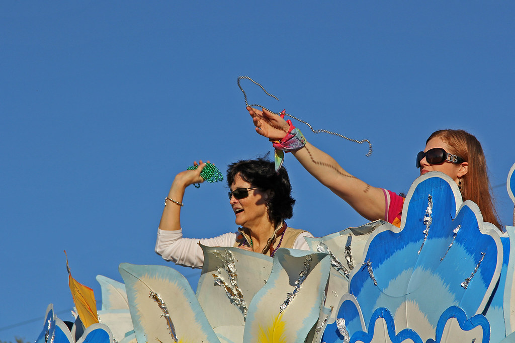 Throwing Beads New Orleans is famous for its parades durin… Flickr