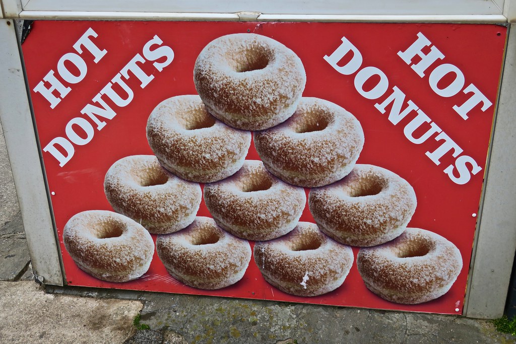 Hot Donuts, Blackpool, UK Sign advertising hot donuts, Bla… Flickr