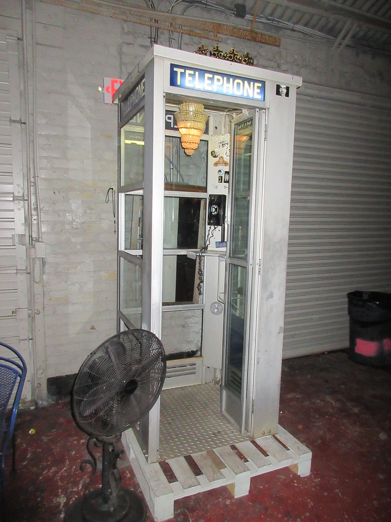 Telephone booth at Marigny Art Garage Carnival party Infrogmation