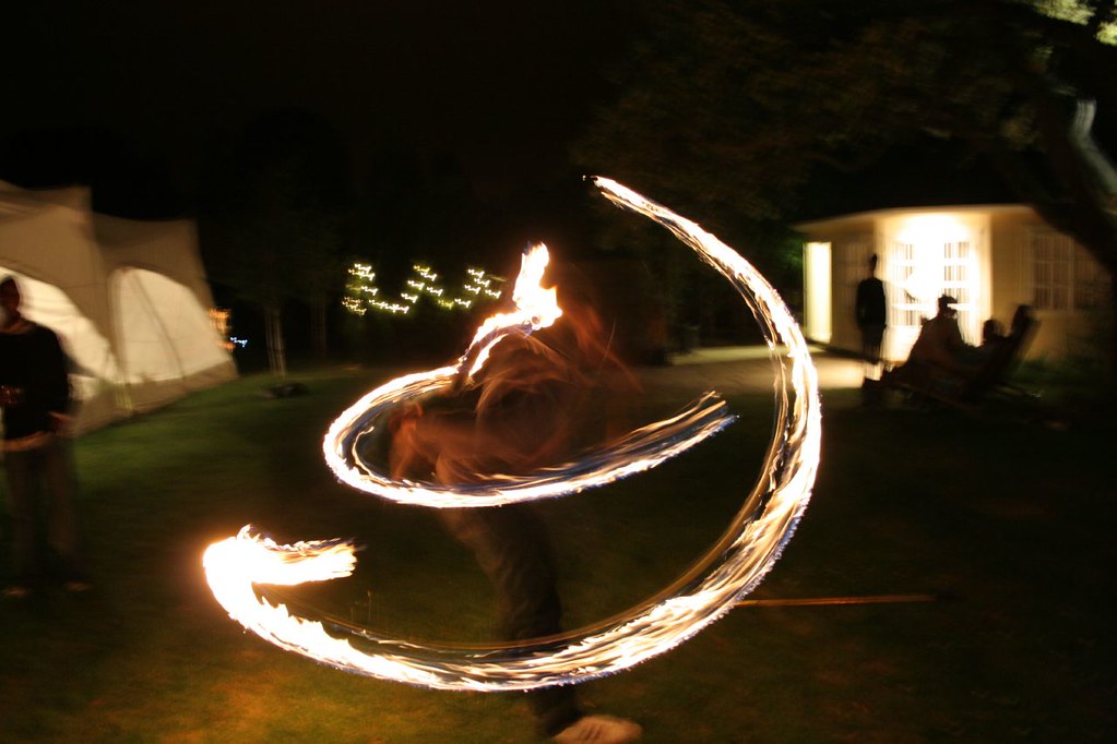 Flame Games 3 People playing with fire sticks and parafin … Flickr