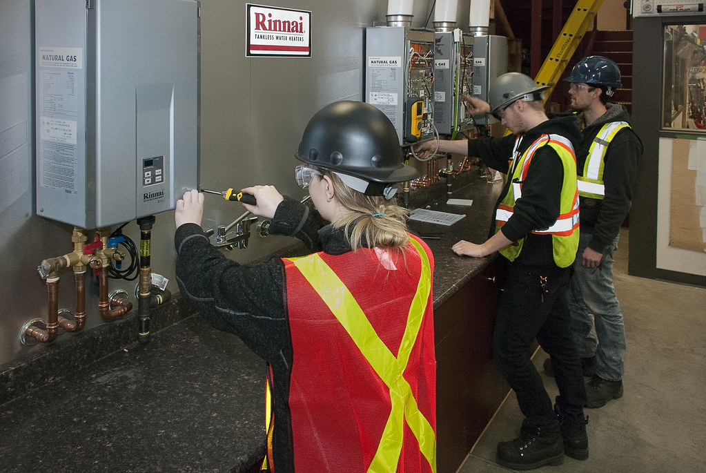 Tankless water heater lab Plumbing students left to right… Flickr