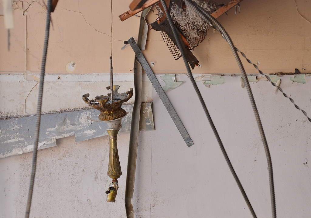 broken and dangling light fixture and other bits and piece… Flickr