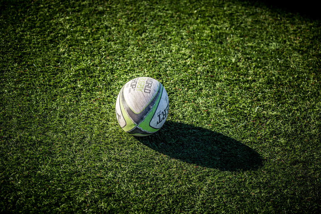 Rugby A rugby ball sits on the turf in between games at th… Flickr