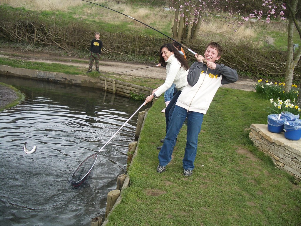 Trout Farm fishing Henry catching thr first fish withi… Flickr