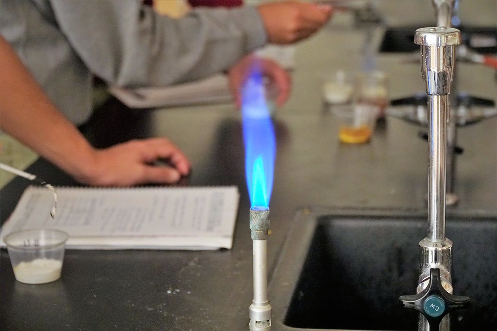 Chemistry Students Experiment with Flame Lab Brother Martin High School
