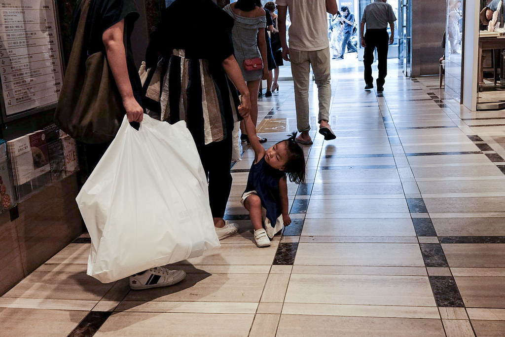Temper Tantrum A toddler throws a temper tantrum in a shop… Flickr