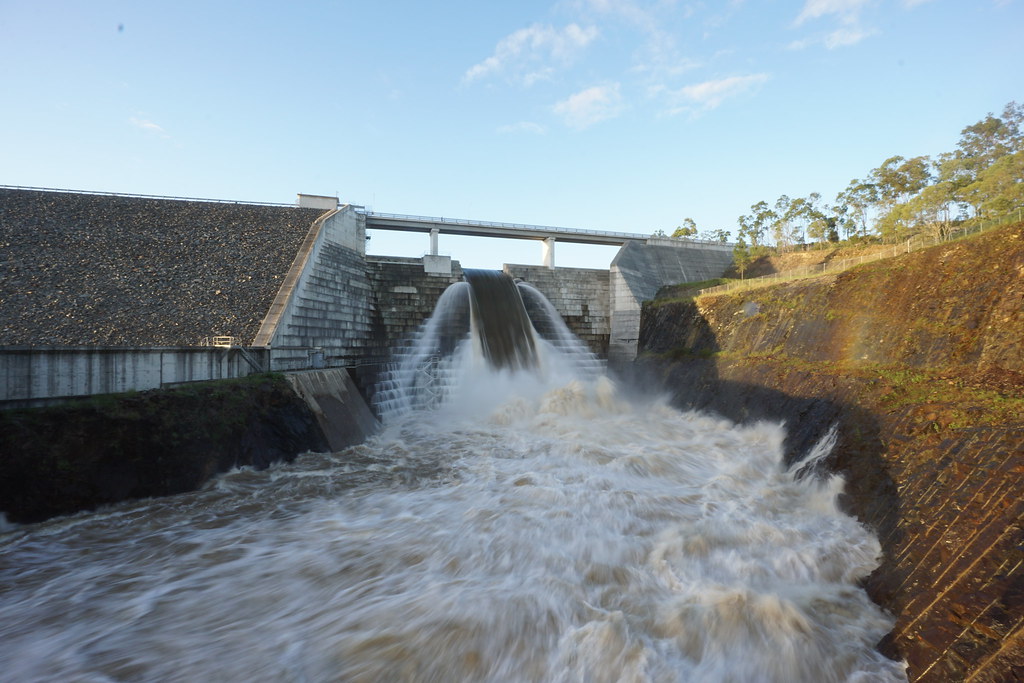 Spilling Hinze Dam spilling over. After visiting many time… Flickr