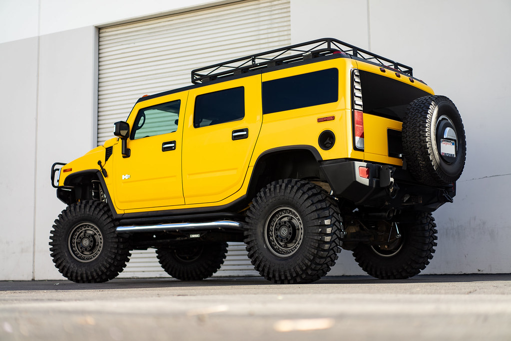 Yellow lifted Hummer H2 on Black Rhino Armory gunblack gunmetal