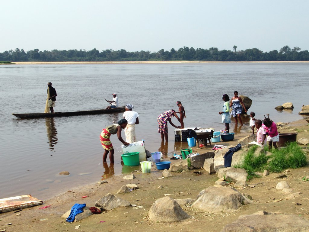Washing Clothes in the River The women of Abongo village n… Flickr