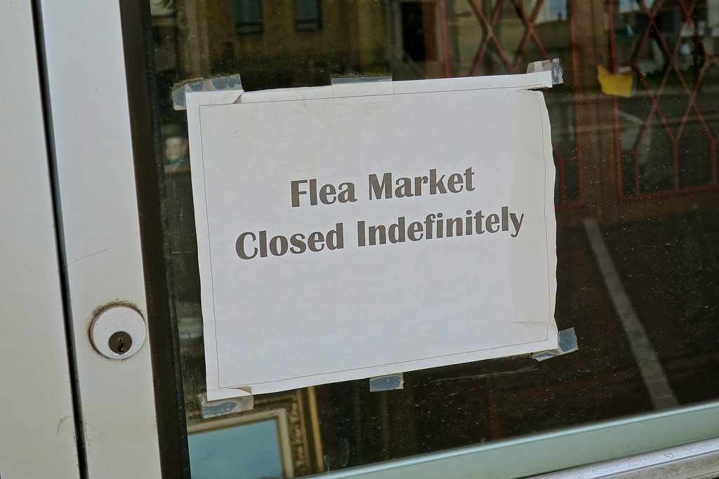 Flea Market, MO Sign in a store window in Flickr