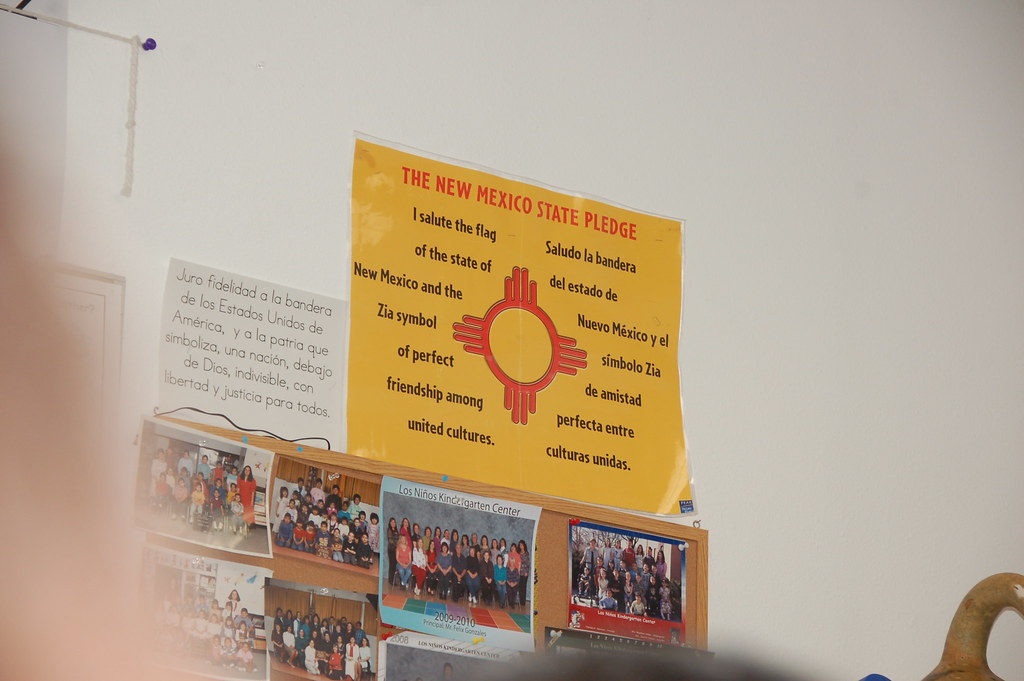 The students are learning the New Mexico state pledge. Flickr