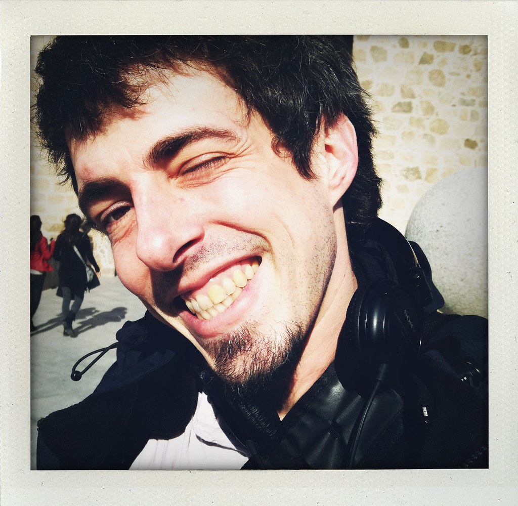 Film maker, Holden Warren happy on a bridge. Katie.Meyler Flickr