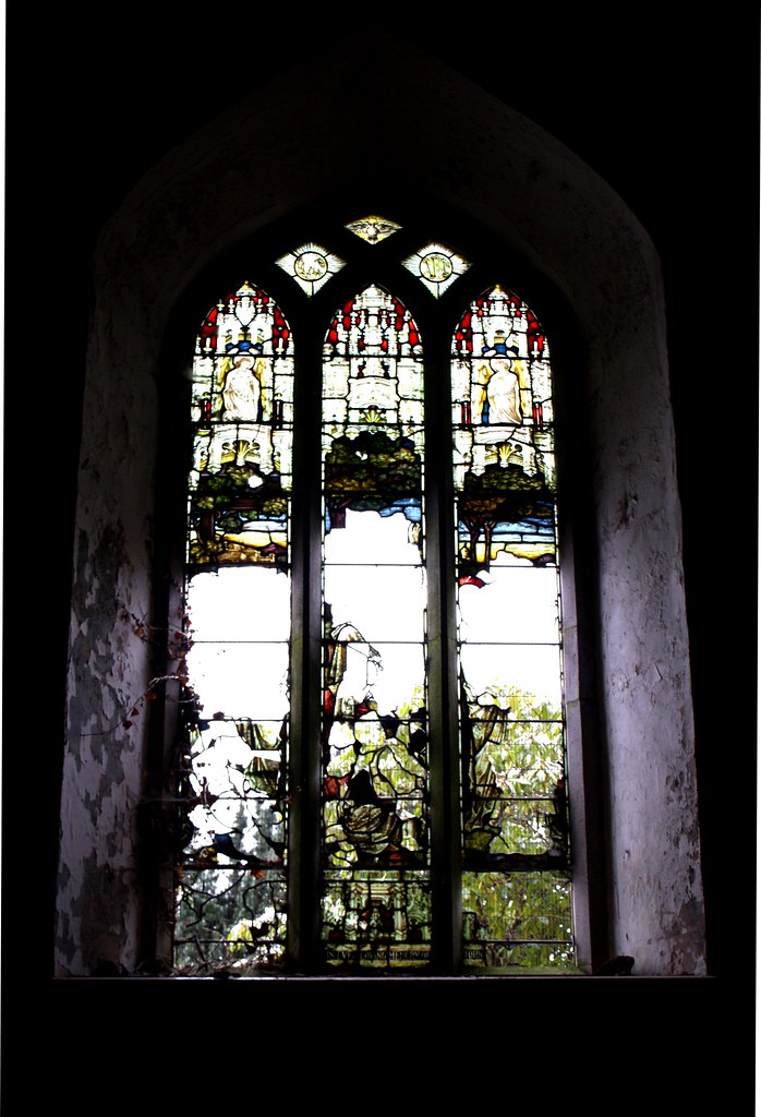 Glass Remnants of stained glass window in the old abandone… Flickr