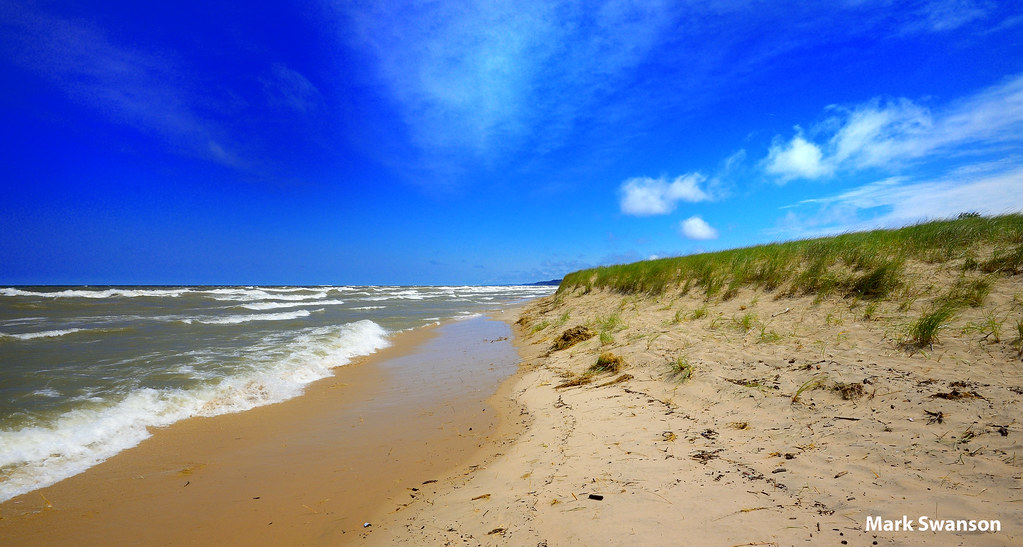 Where land meets water Looking north along Lake Michigan. … Flickr