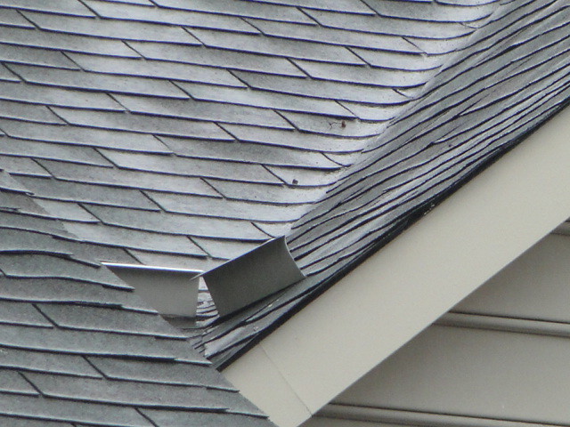 Water diverter on roof Water diverter fastened in the midd… Flickr