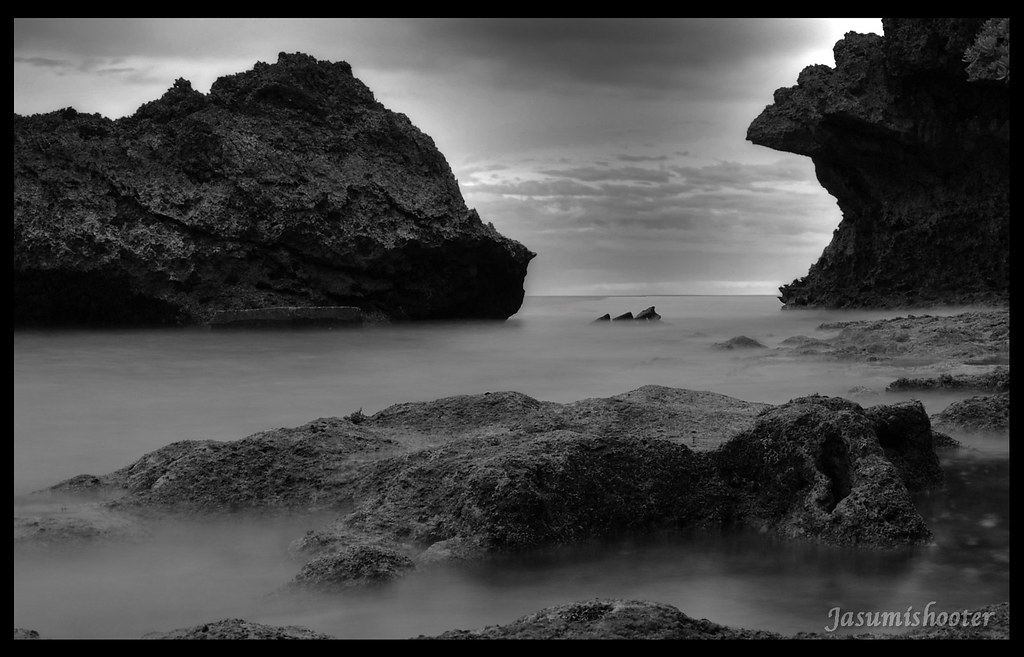 Okinawa B&W a long exposure through some huge coral rocks … Flickr