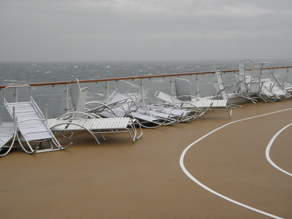 PC120670 Decks chairs all in a pile, whitecaps in the ocea… Flickr