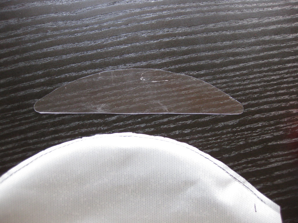 Visor stiffener (plastic packaging piece) How much crap co… Flickr
