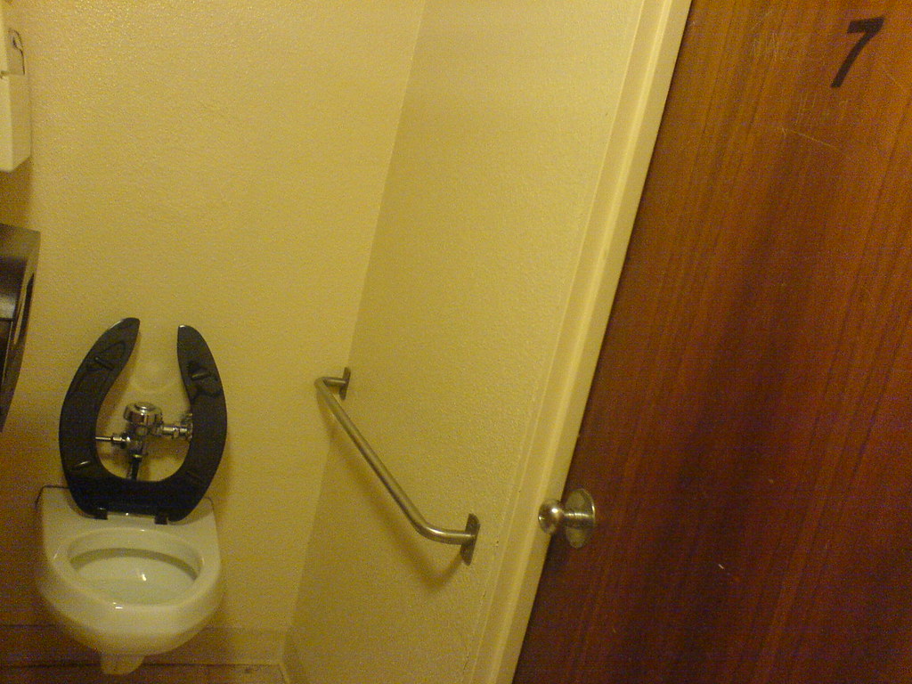 Why does my bathroom stall also have a door? Brett L. Flickr