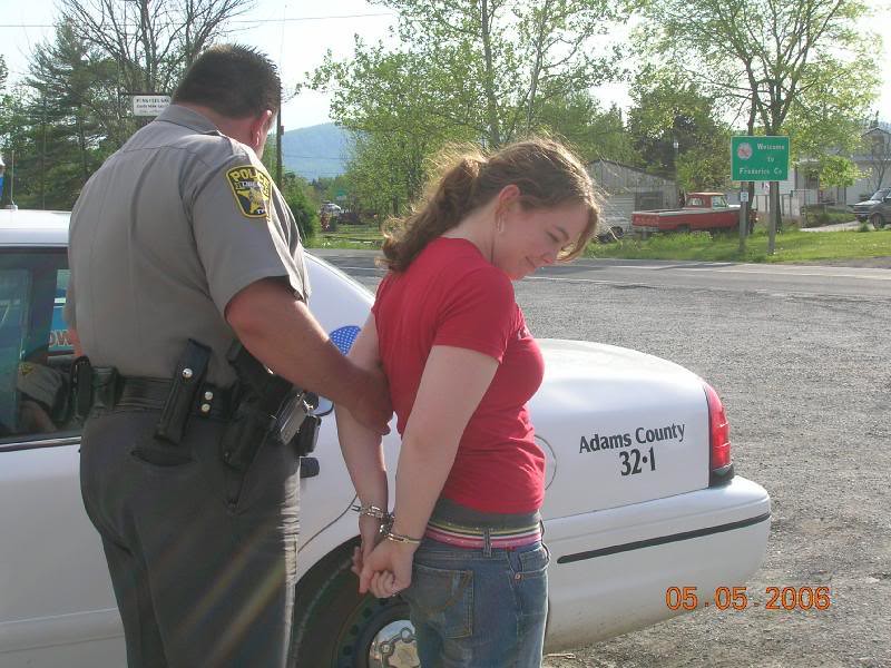 teen girl arrested teen girl handcuffed and under arrest. wowhead2