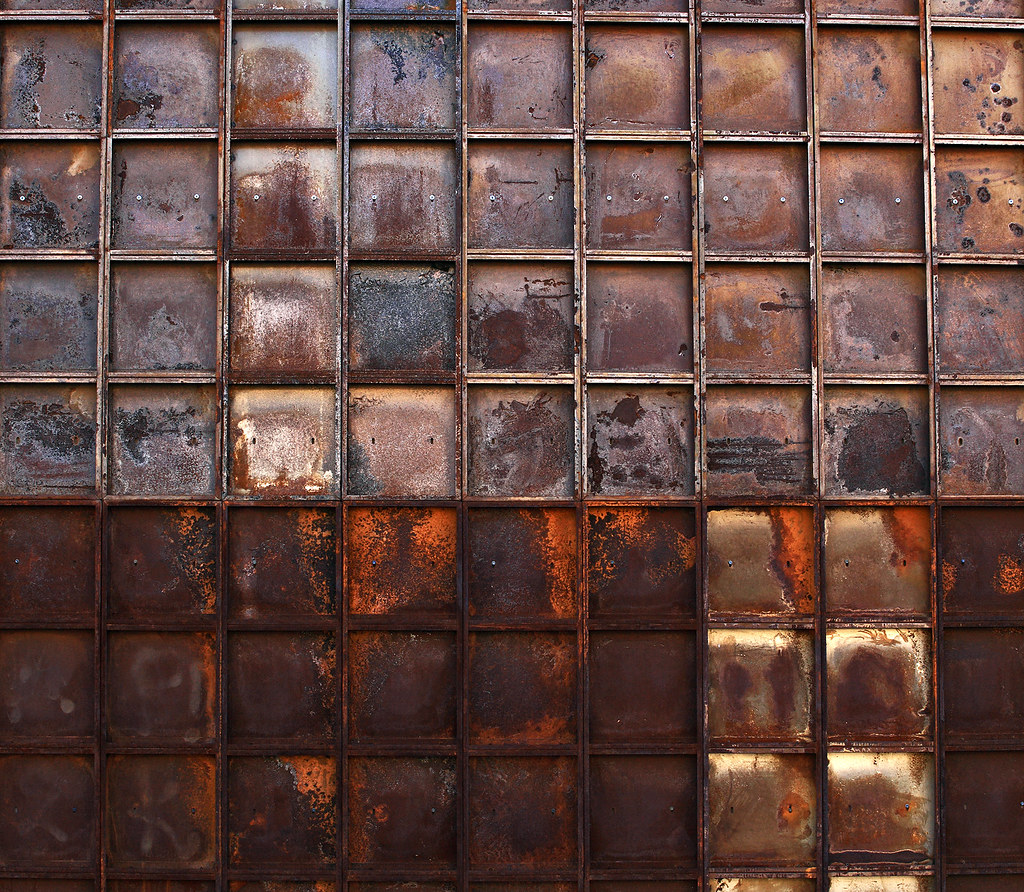 Urban Rustique Rusted metal panels completely fill the ext… Flickr