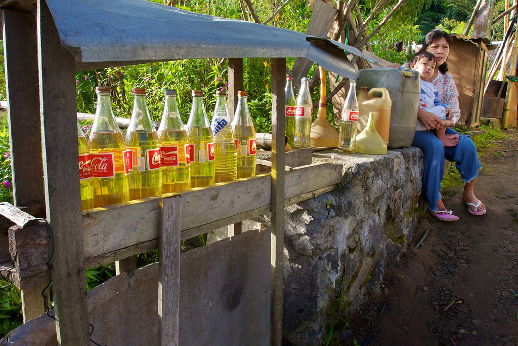 Indonesian Mini Gas Station CocaCola Bottles Filled wit… Flickr