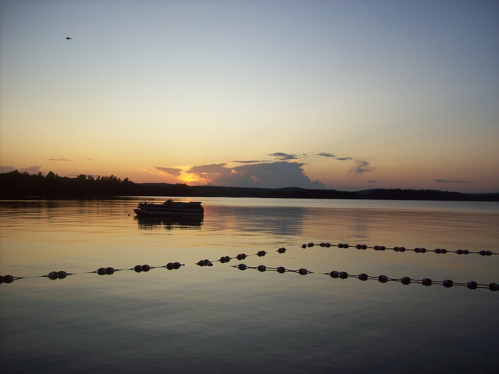 North Pond Sun setting on The North Pond, Maine Laura Stoops Flickr