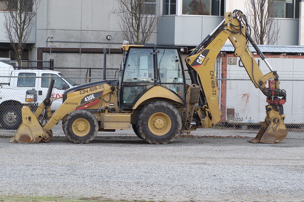 CAT 430E CN backhoe in Vancouver BC. fleandca Flickr