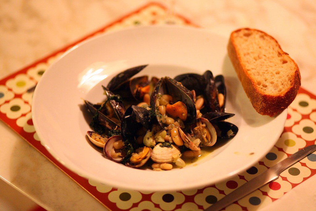 Mussels & clams with vermouth, cannellini beans, and caval… Flickr